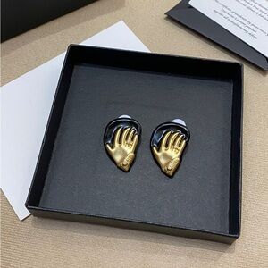 Elegant Gold and Black Hand Earrings